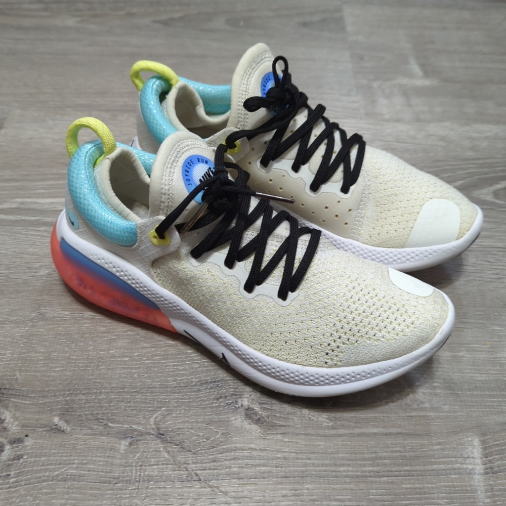 Nike Athletic Shoes in Cream, Blue, and Red